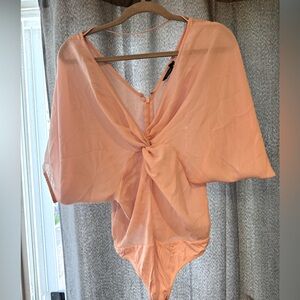 Sheer pink bodysuit by Marciano